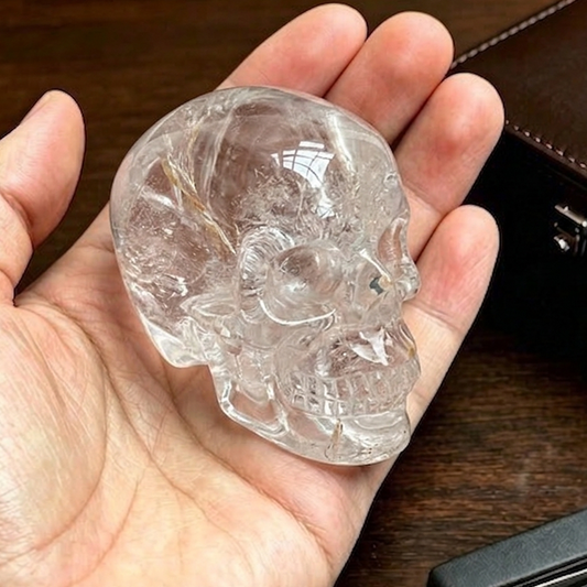 Additional view of a 2-inch Clear Quartz human skull carving