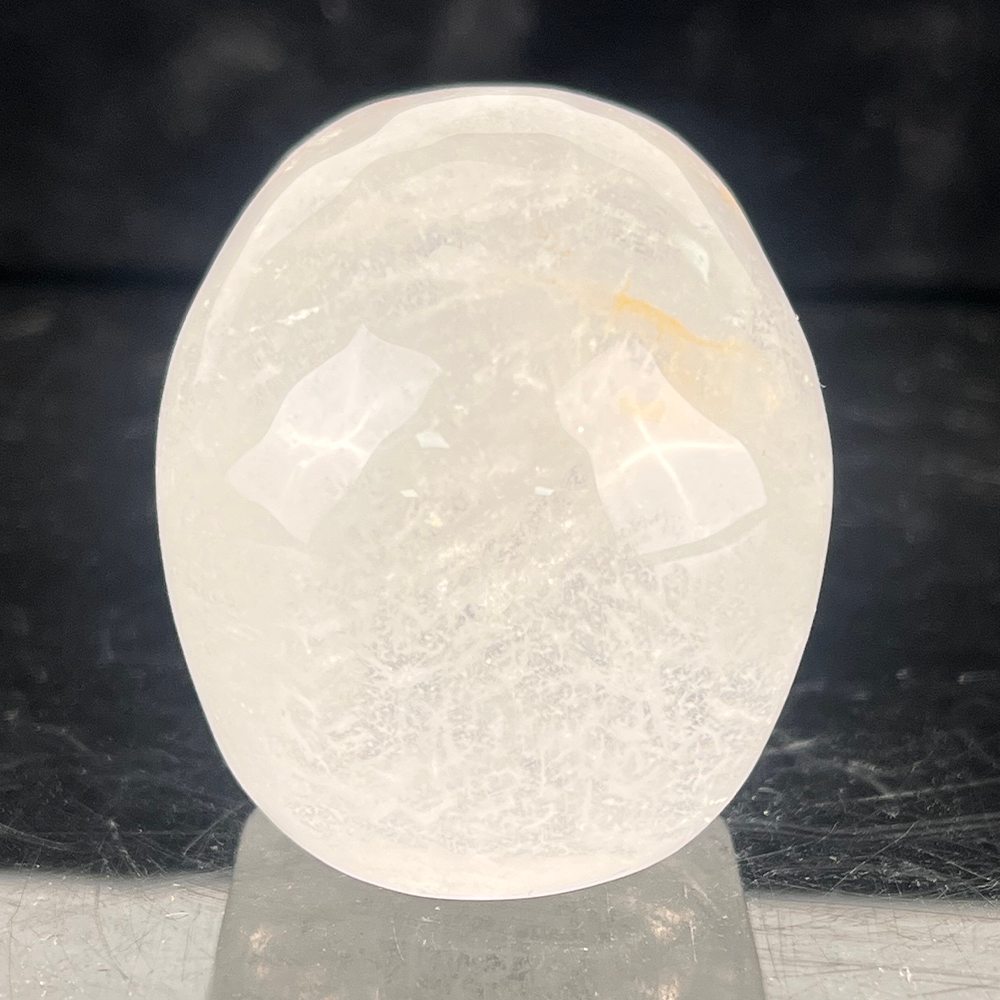 Back view of a 2-inch Clear Quartz human skull carving