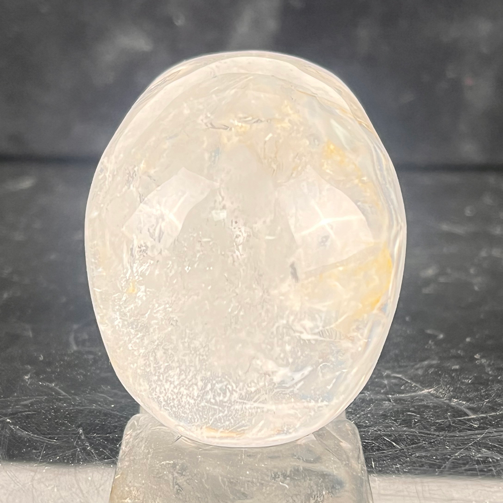 Back view of a 2-inch Clear Quartz human skull carving