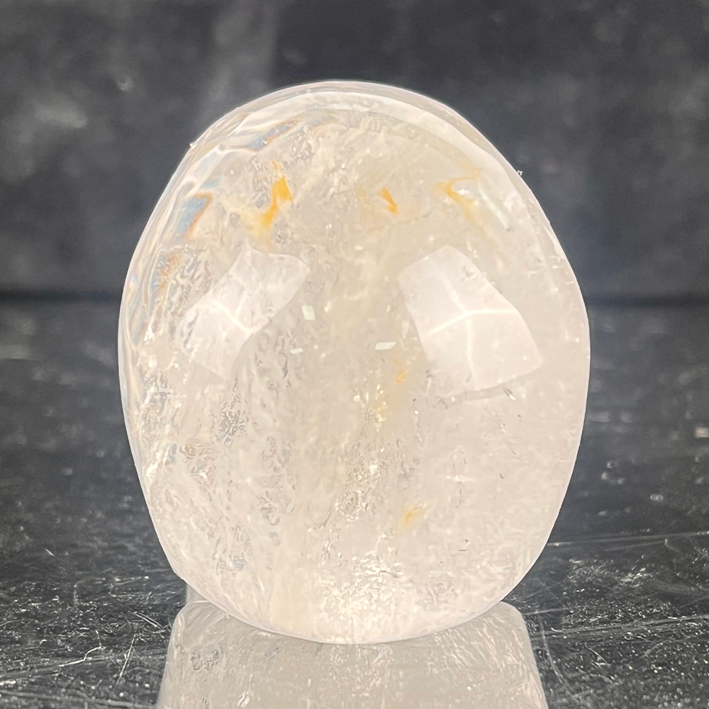 Back view of a 2-inch Clear Quartz human skull carving