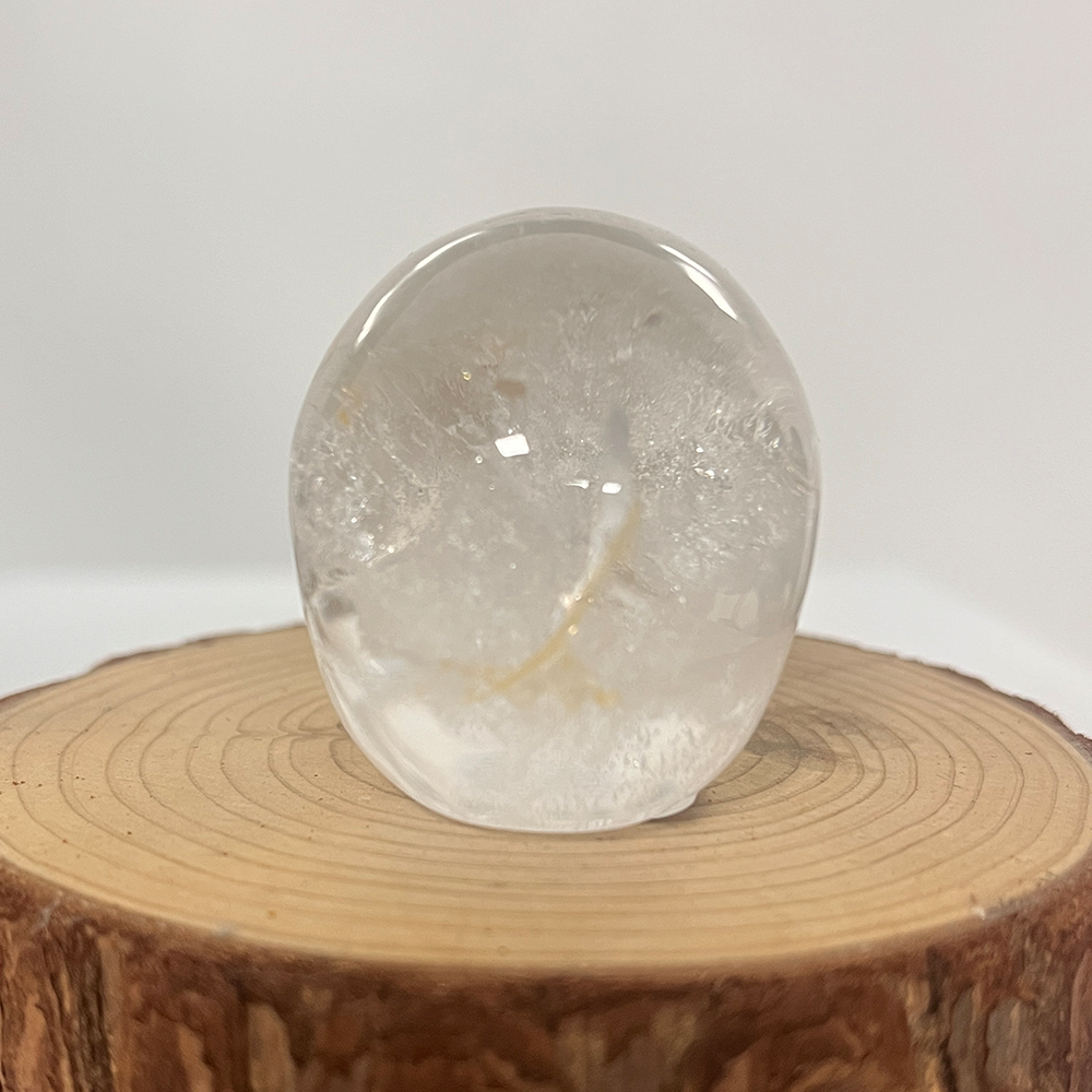 Back view of a 2-inch Clear Quartz human skull carving
