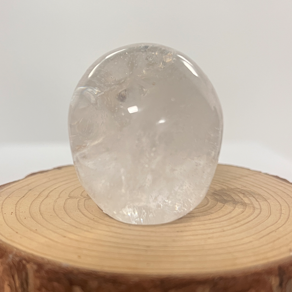 Back view of a 2-inch Clear Quartz human skull carving