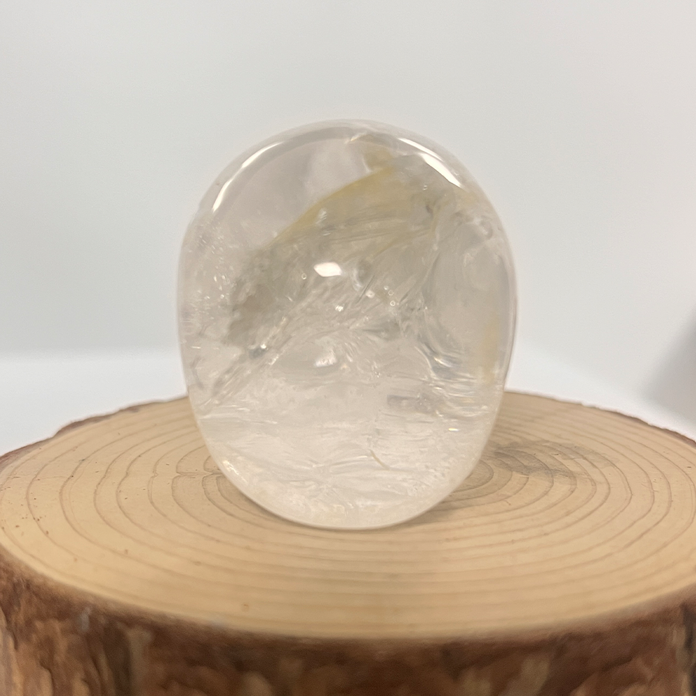 Back view of a 2-inch Clear Quartz human skull carving