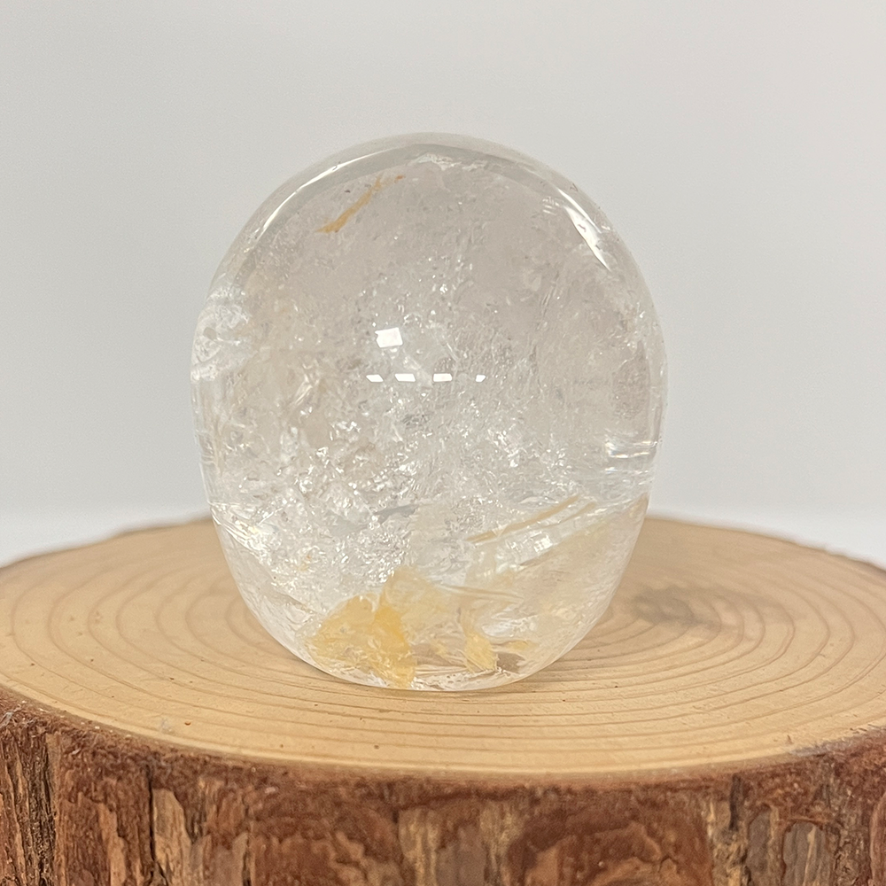 Back view of a 2-inch Clear Quartz human skull carving