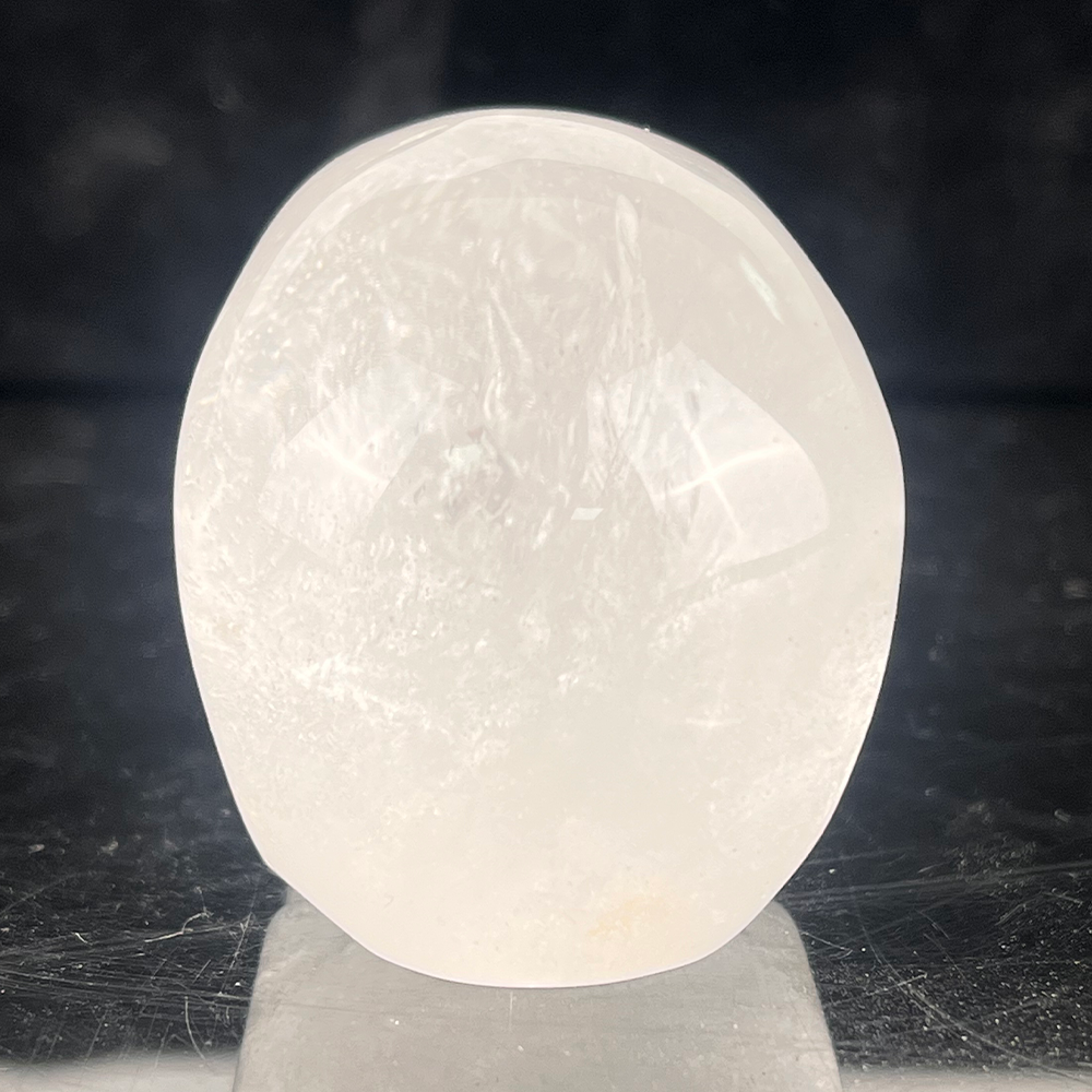 Back view of a 2-inch Clear Quartz human skull carving