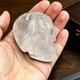 Main view of a 2-inch Clear Quartz human skull carving