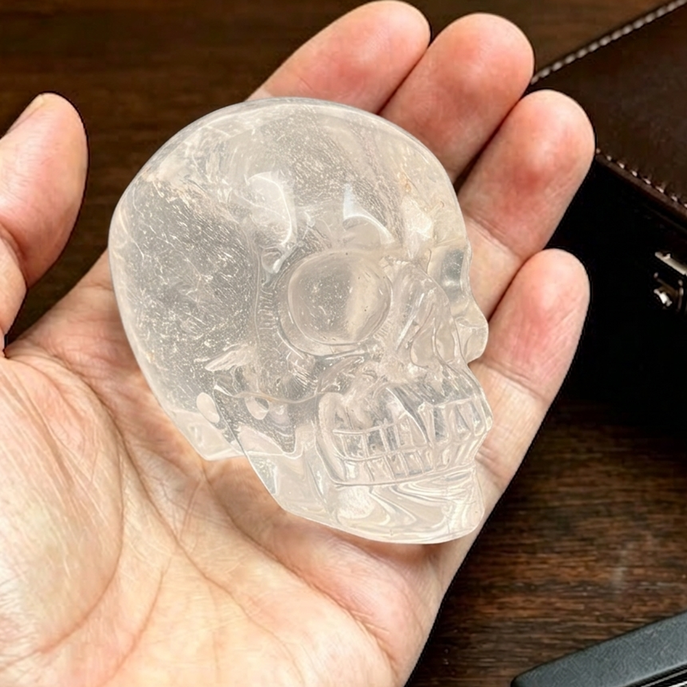 Main view of a 2-inch Clear Quartz human skull carving