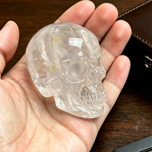 Main view of a 2-inch Clear Quartz human skull carving