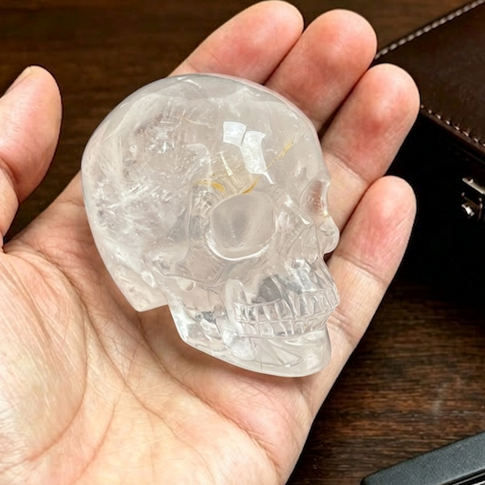 Main view of a 2-inch Clear Quartz human skull carving