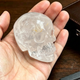Main view of a 2-inch Clear Quartz human skull carving