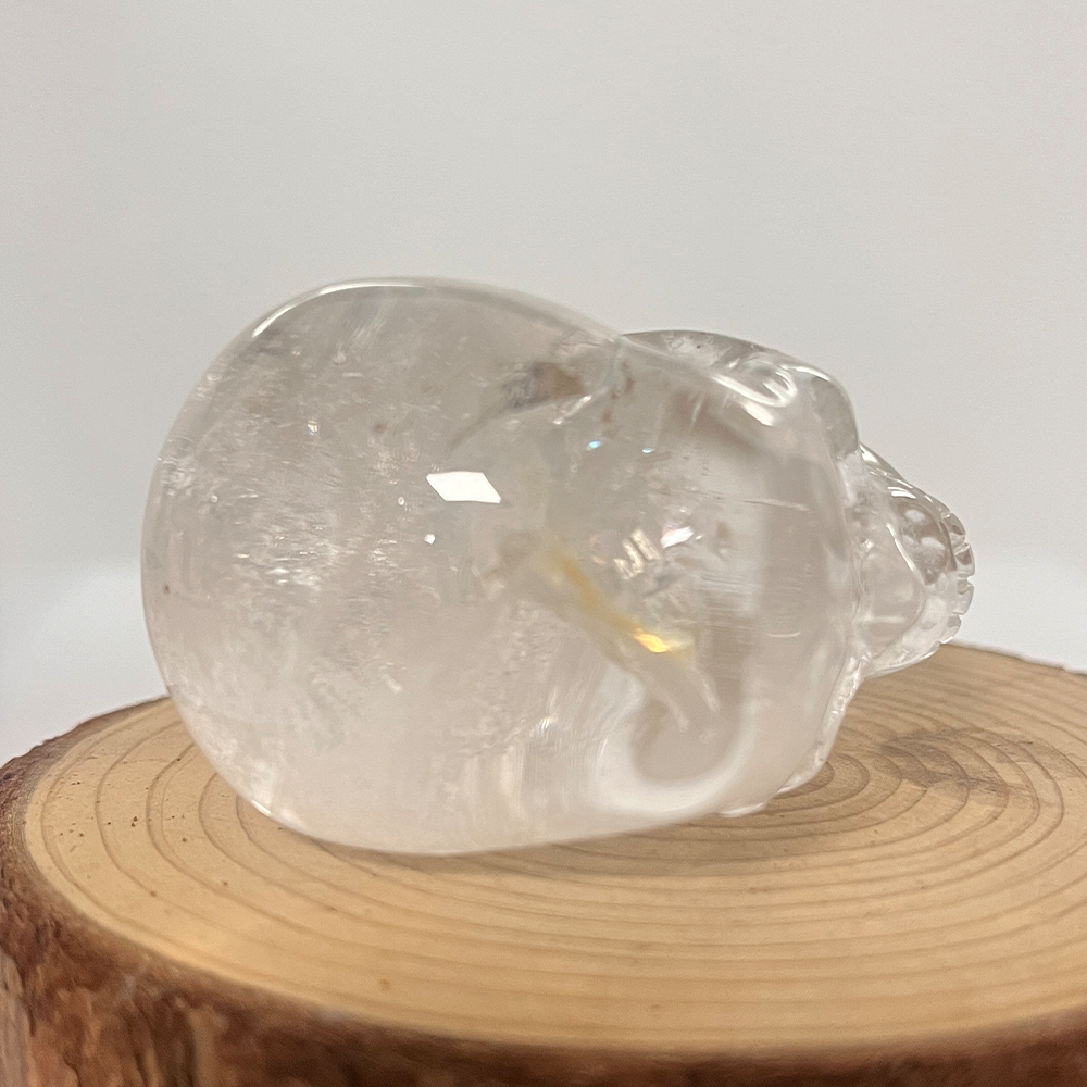 Top view of a 2-inch Clear Quartz human skull carving