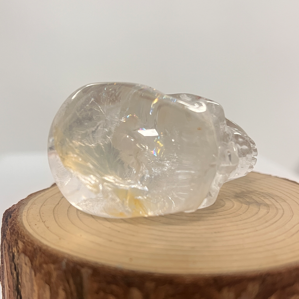 Top view of a 2-inch Clear Quartz human skull carving