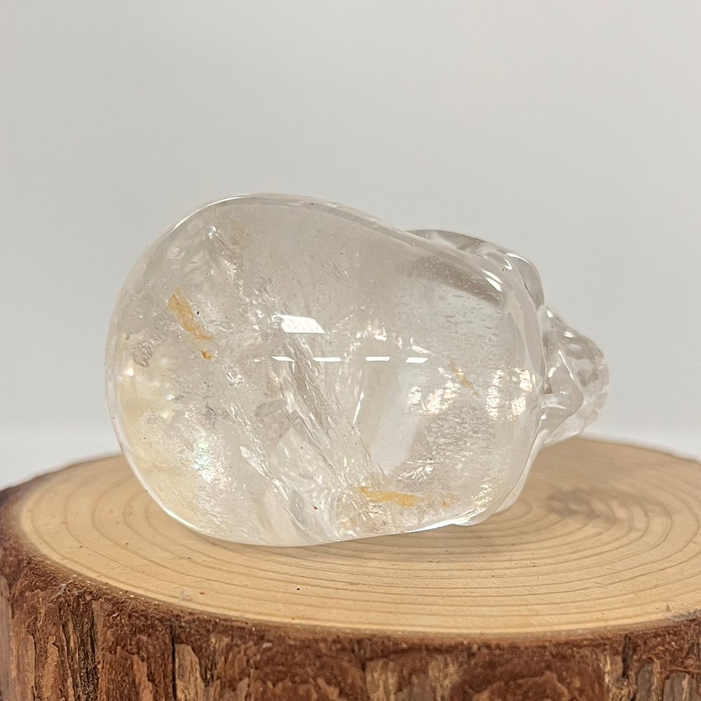 Top view of a 2-inch Clear Quartz human skull carving
