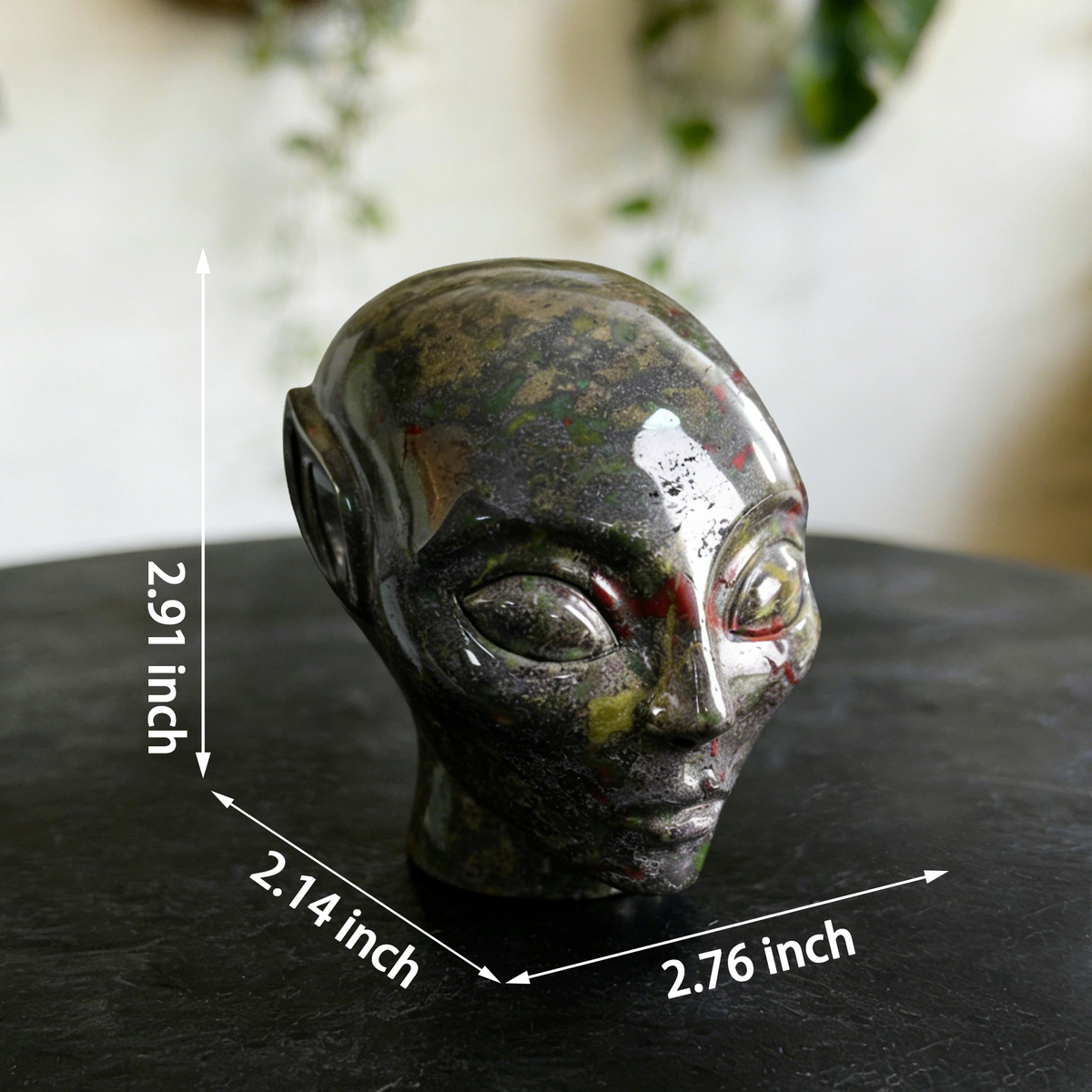 Additional view of a 3-inch Dragon Bloodstone alien skull carving