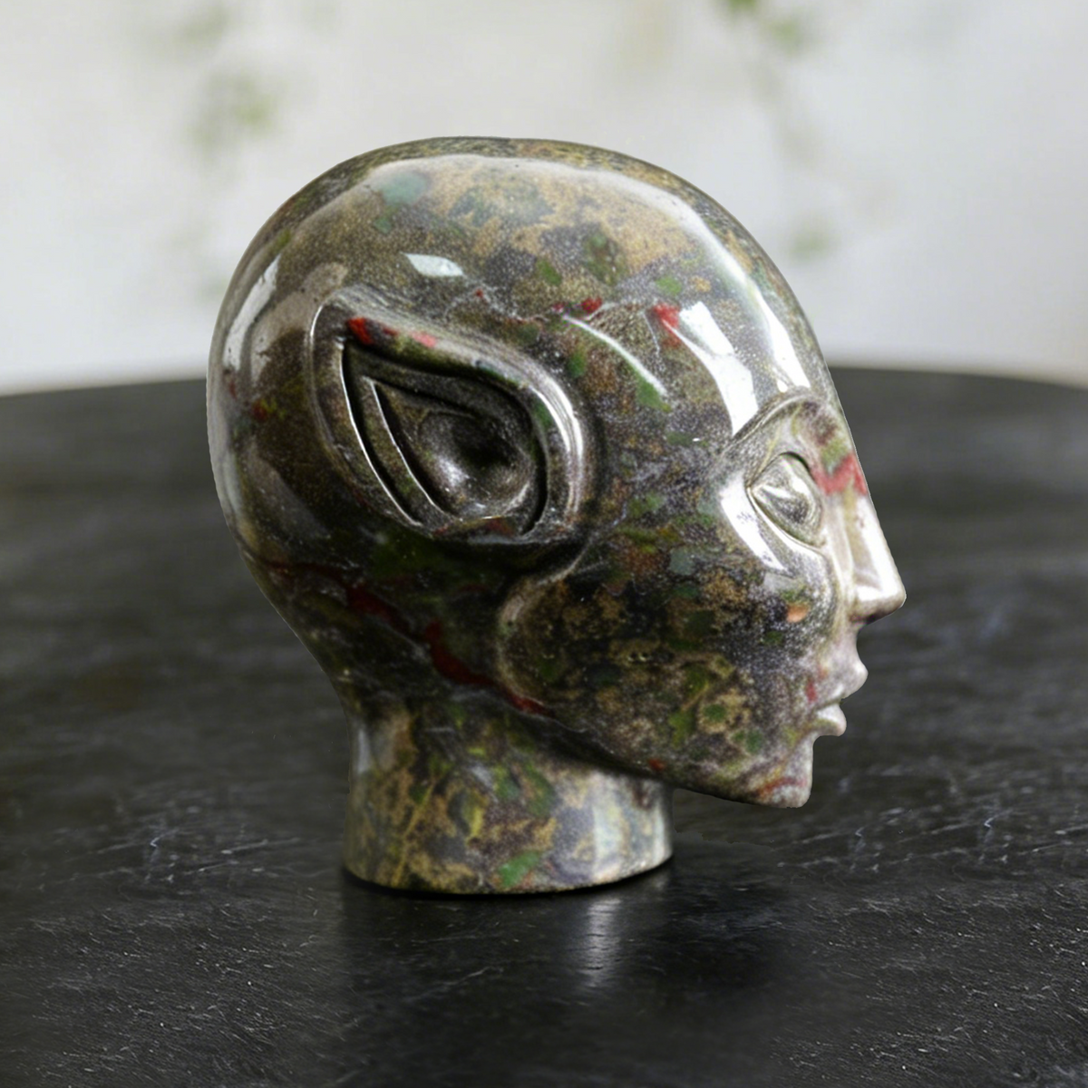 Additional view of a 3-inch Dragon Bloodstone alien skull carving