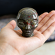 Additional view of a Dragon Bloodstone alien skull carving