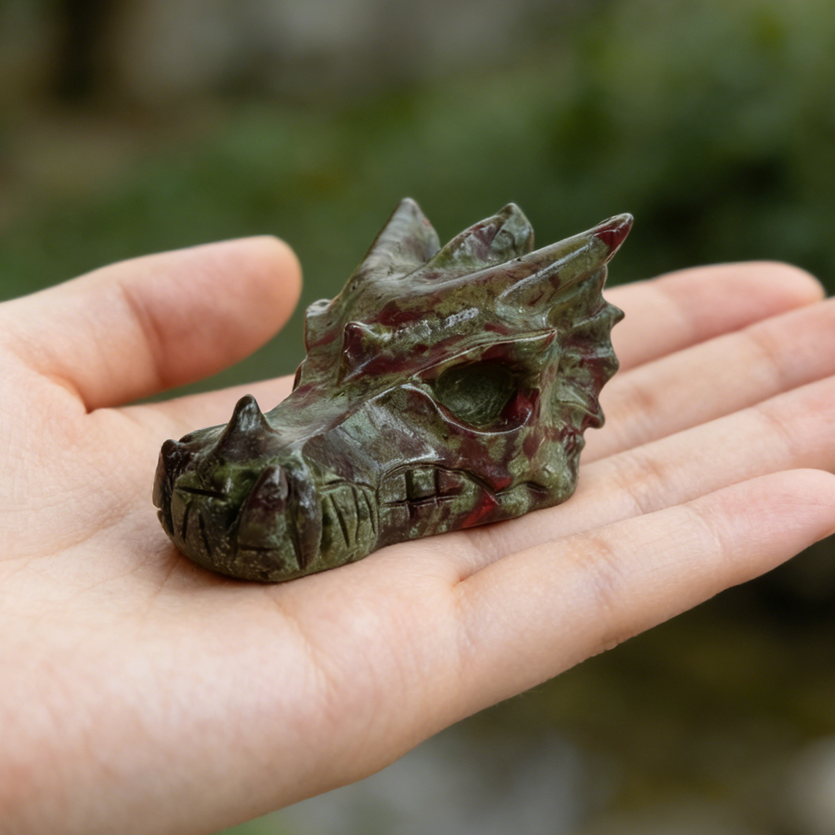 Additional view of a 2-inch Dragon Bloodstone dragon skull carving
