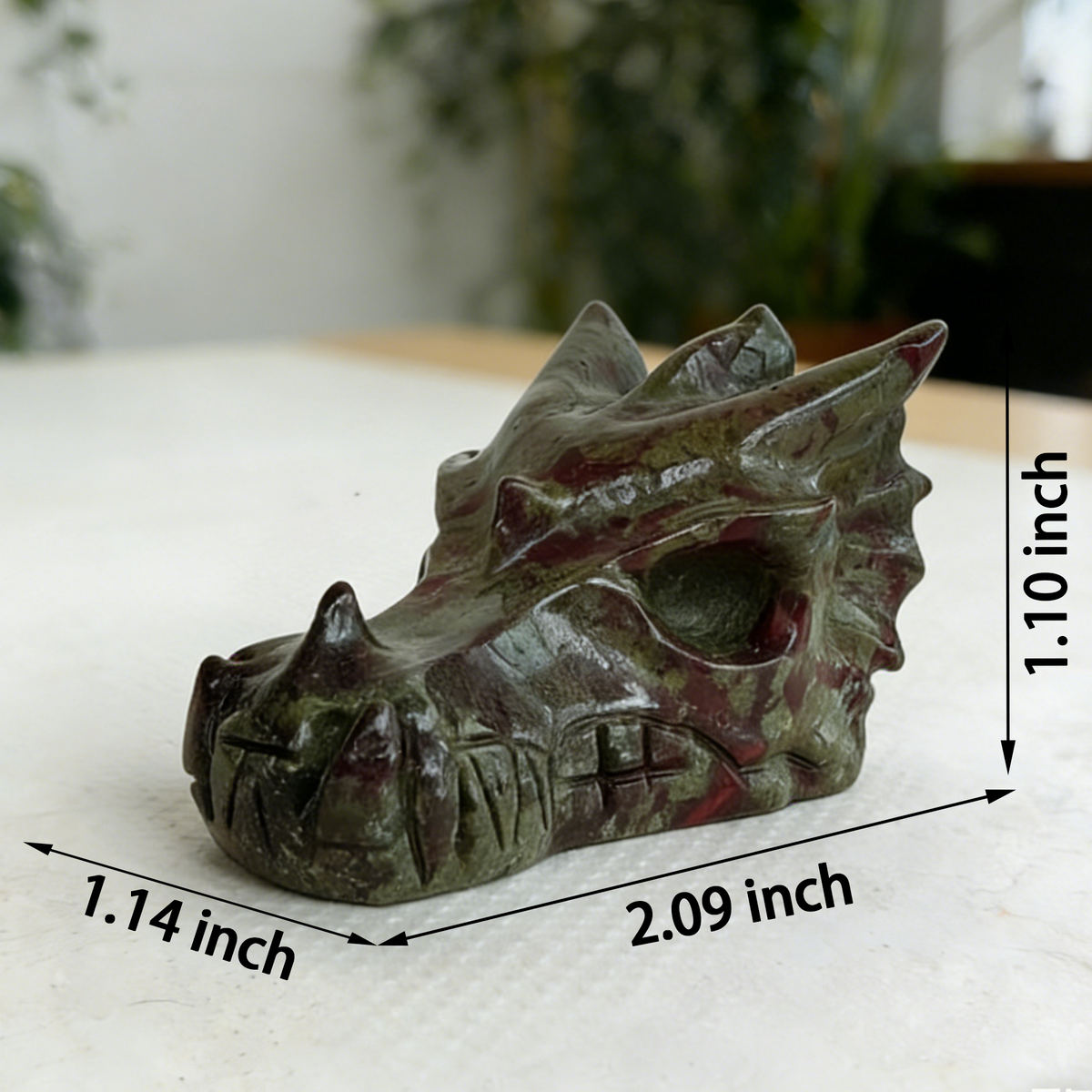 Additional view of a 2-inch Dragon Bloodstone dragon skull carving