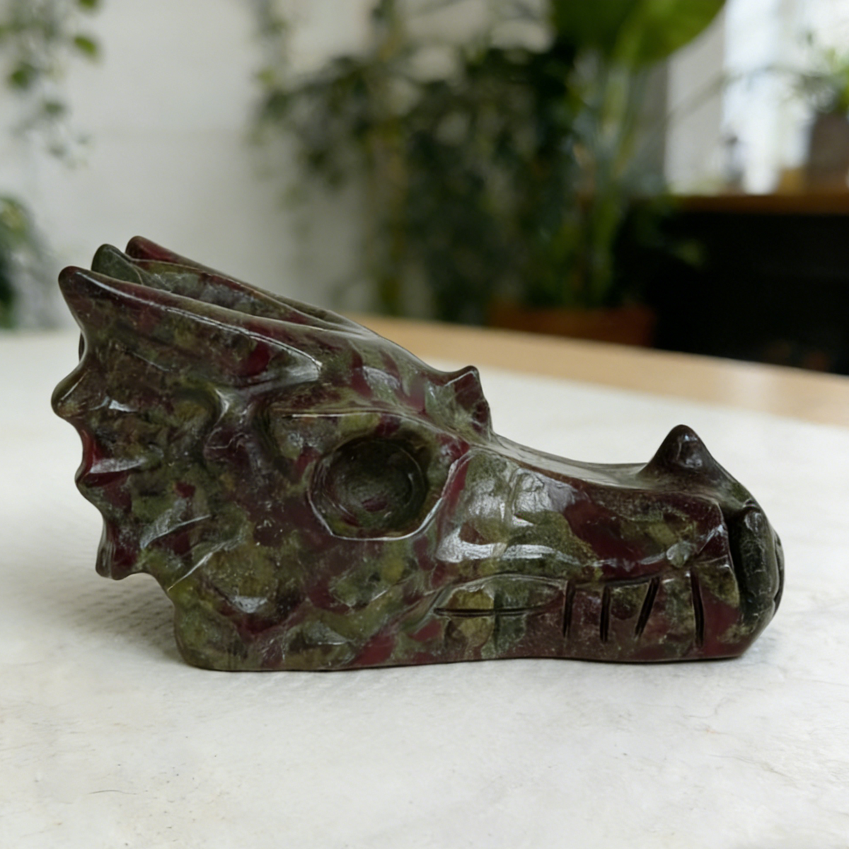 Additional view of a 2-inch Dragon Bloodstone dragon skull carving