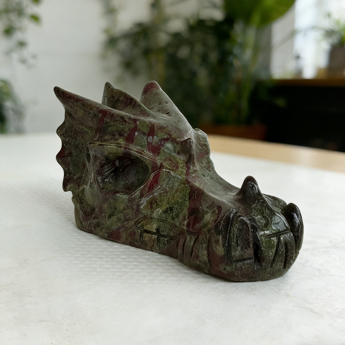 Additional view of a 2-inch Dragon Bloodstone dragon skull carving