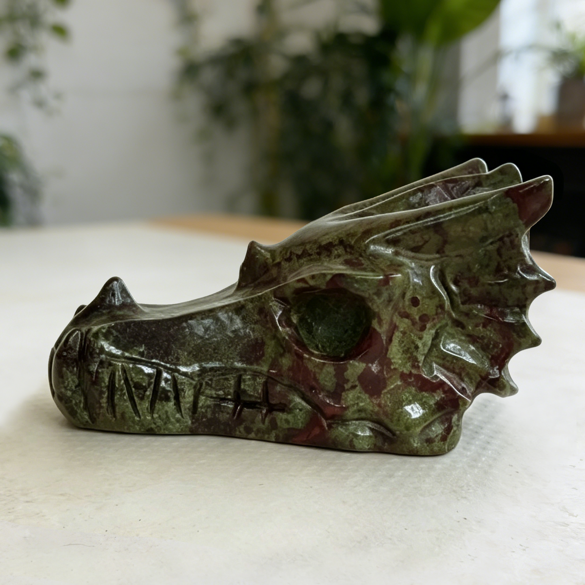 Additional view of a 2-inch Dragon Bloodstone dragon skull carving