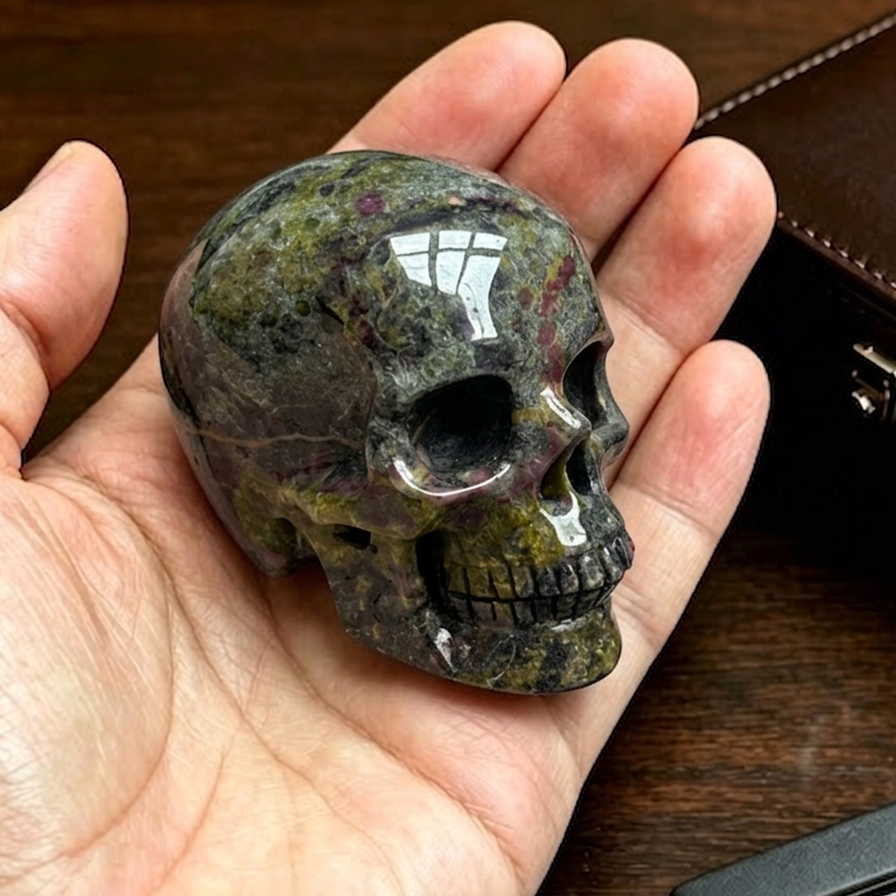Main view of a 2-inch Dragon Bloodstone human skull carving