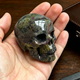 Main view of a 2-inch Dragon Bloodstone human skull carving
