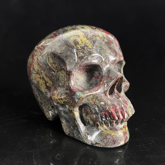 Right-front view of a 4.5-inch Dragon Bloodstone human skull carving