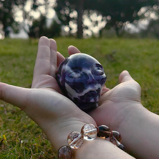 Additional view of a 3-inch Dream Amethyst alien skull carving