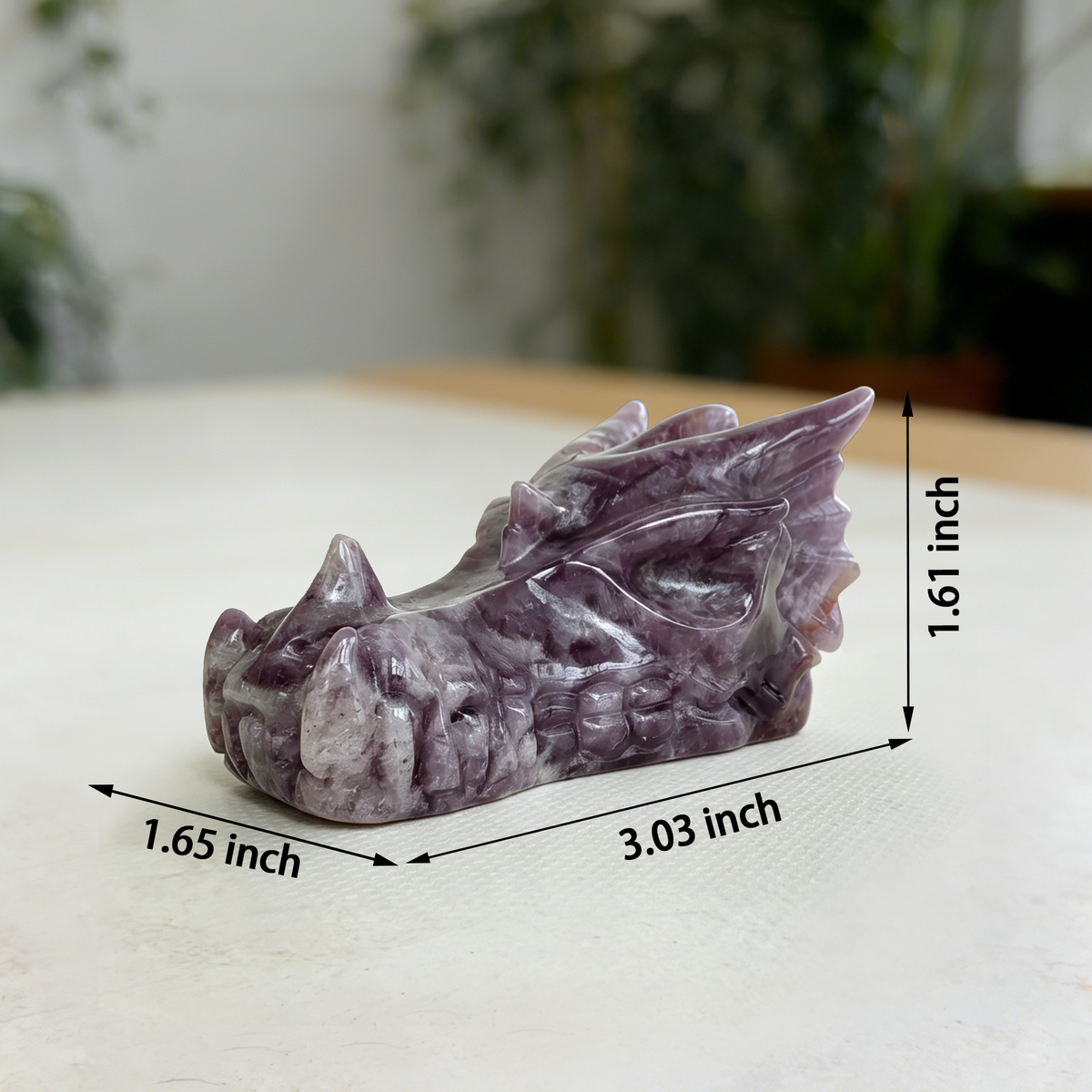 Additional view of a 3-inch Dream Amethyst dragon skull carving