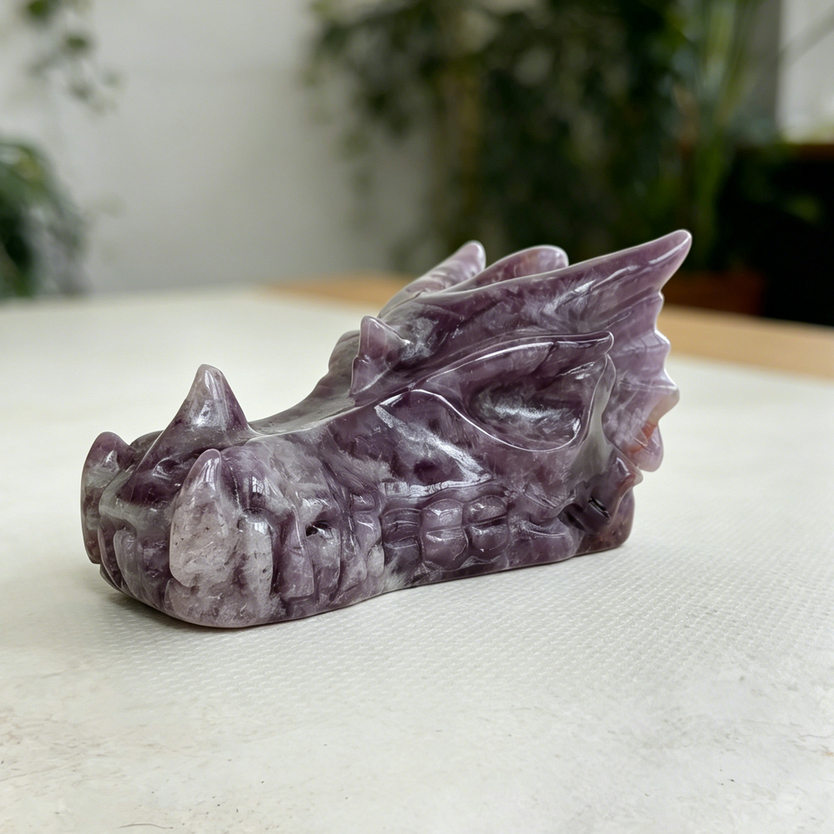 Additional view of a 3-inch Dream Amethyst dragon skull carving