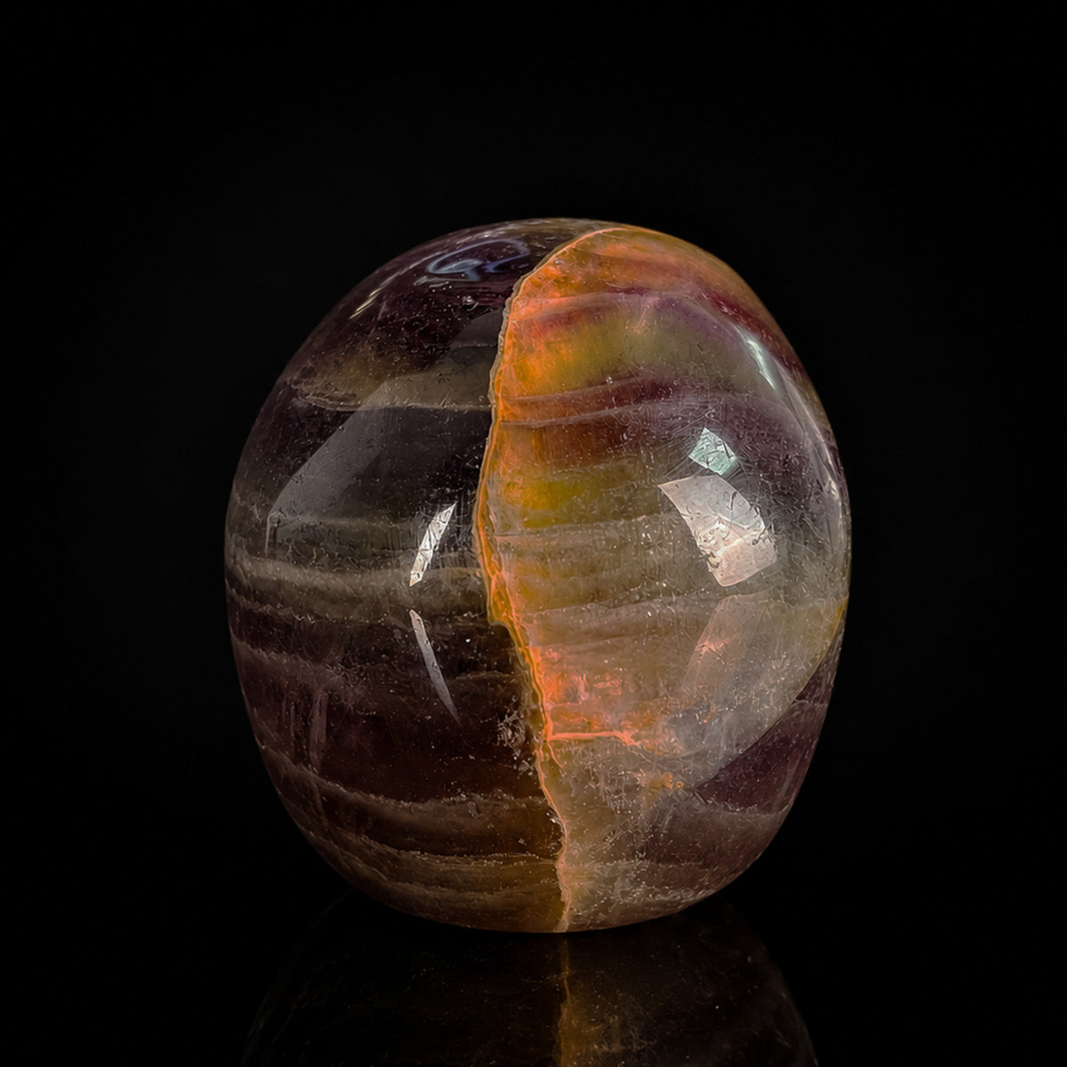 Back view of a 2-inch Fluorite human skull carving