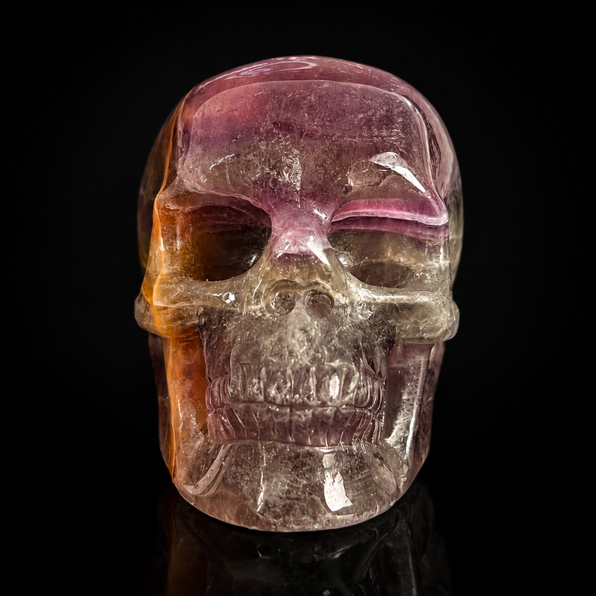 Front view of a 2-inch Fluorite human skull carving