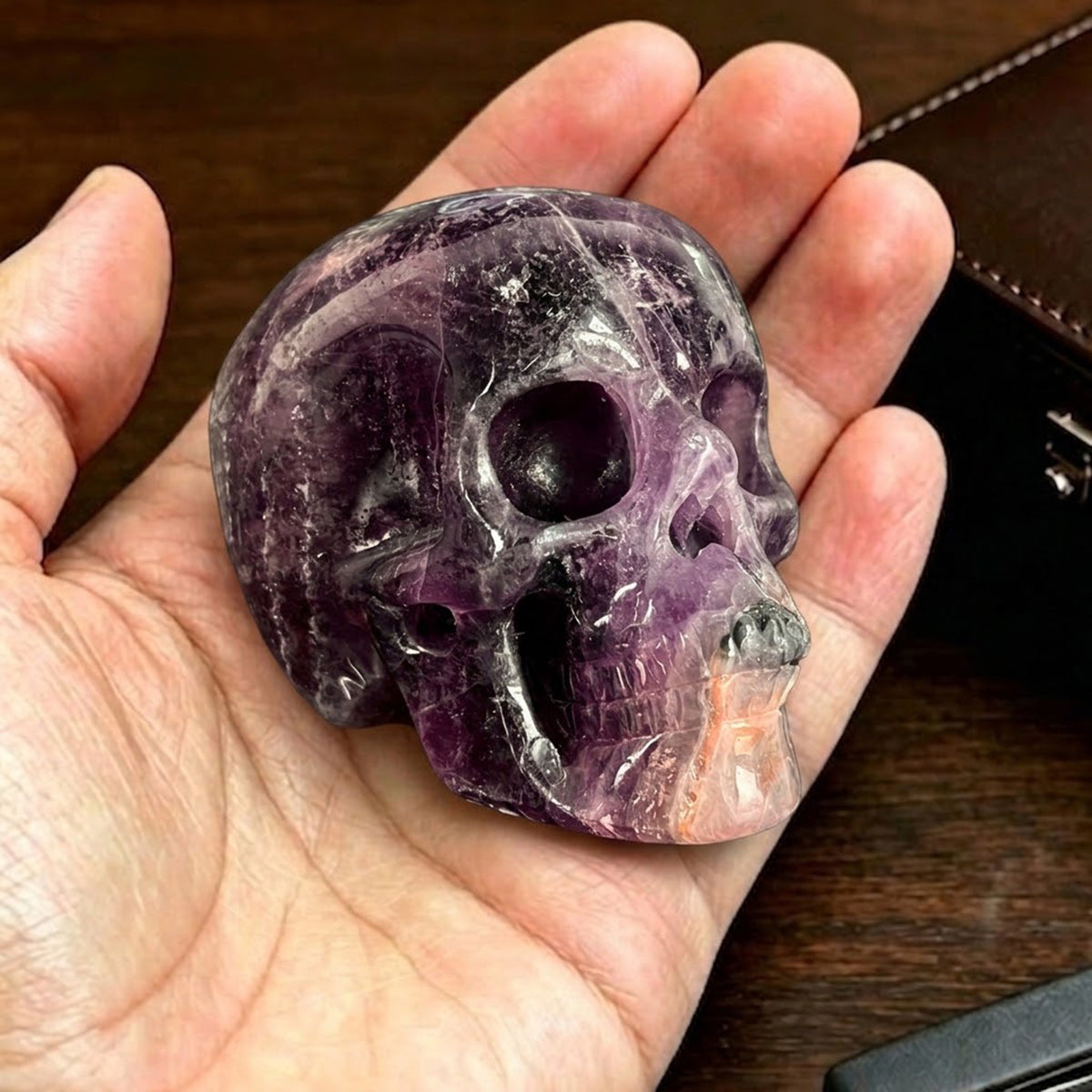 Main view of a 2-inch Fluorite human skull carving
