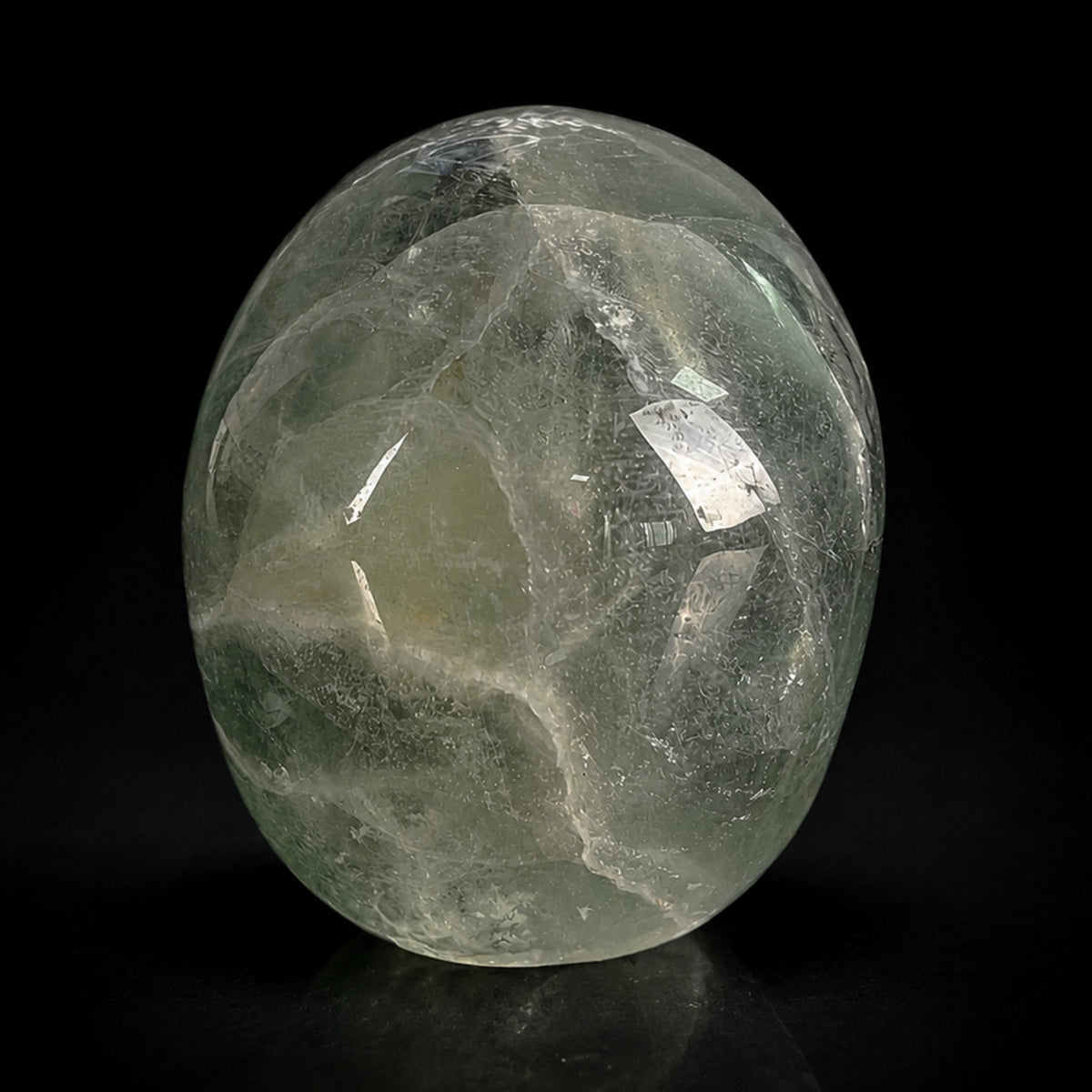 Back view of a 2-inch Fluorite human skull carving