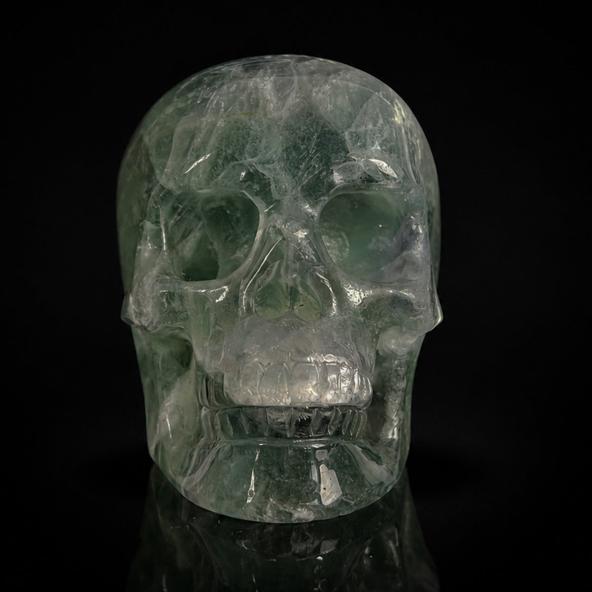 Front view of a 2-inch Fluorite human skull carving