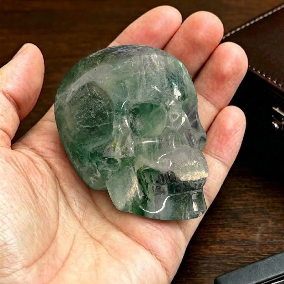 Main view of a 2-inch Fluorite human skull carving