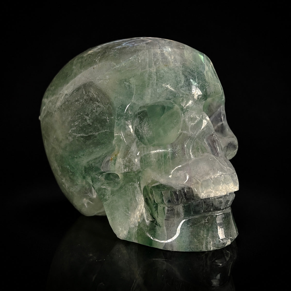 Right-front view of a 2-inch Fluorite human skull carving