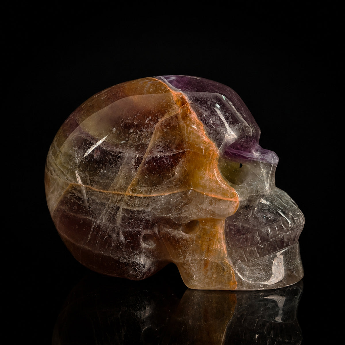 Right view of a 2-inch Fluorite human skull carving