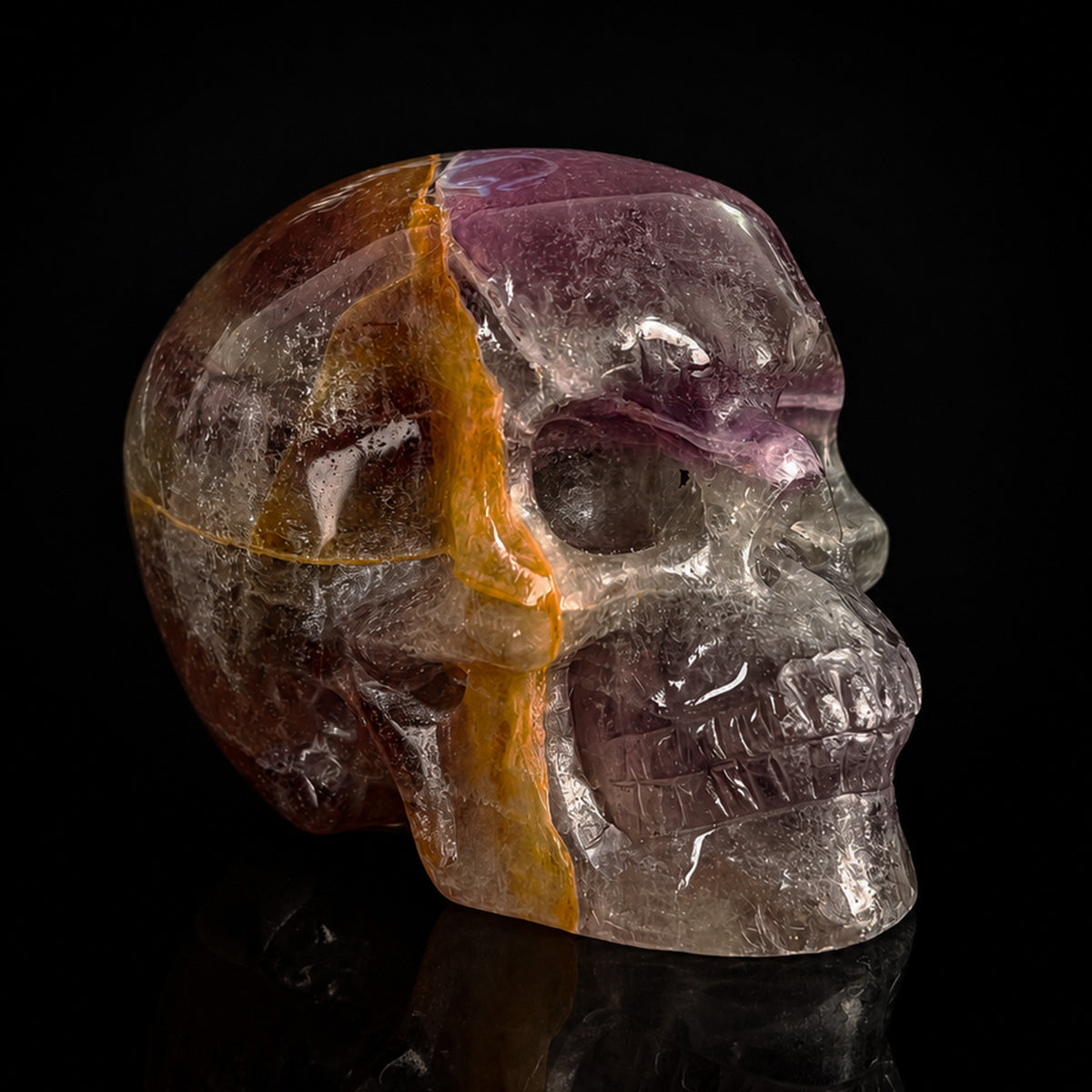 Right-front view of a 2-inch Fluorite human skull carving