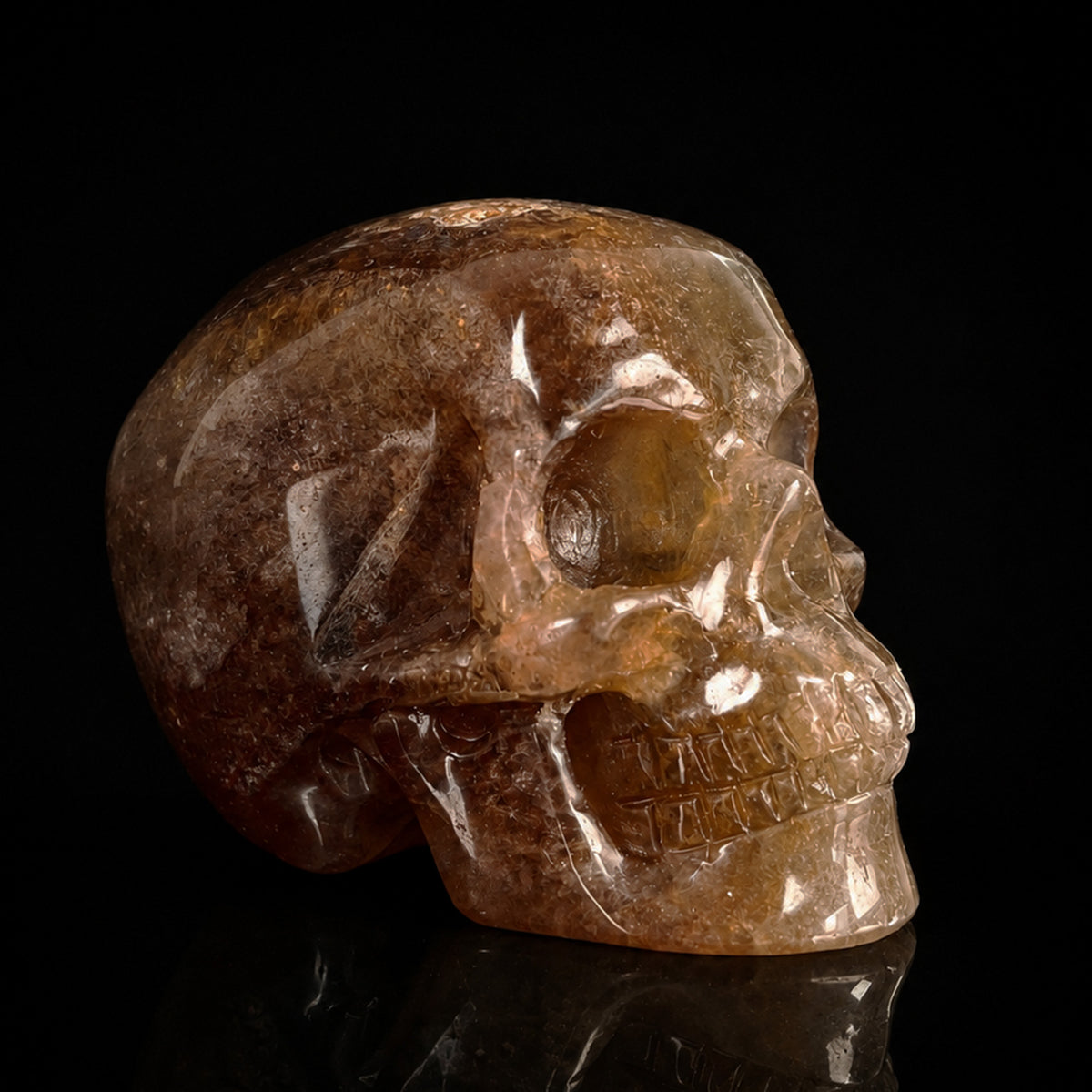 Right-front view of a 2-inch Fluorite human skull carving