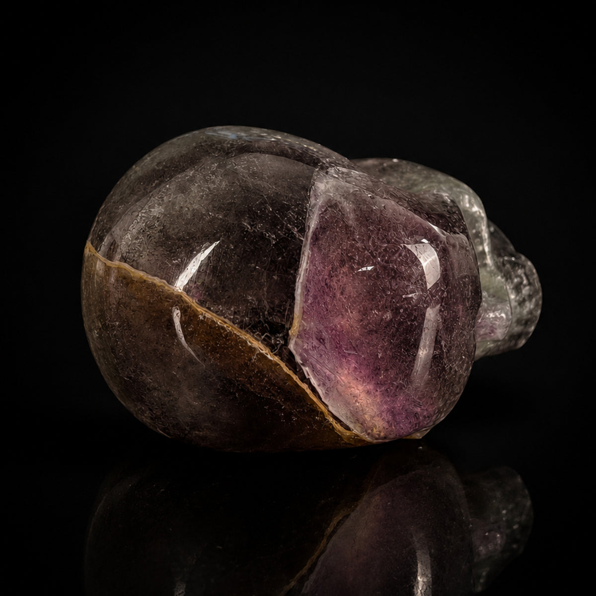 Top view of a 2-inch Fluorite human skull carving