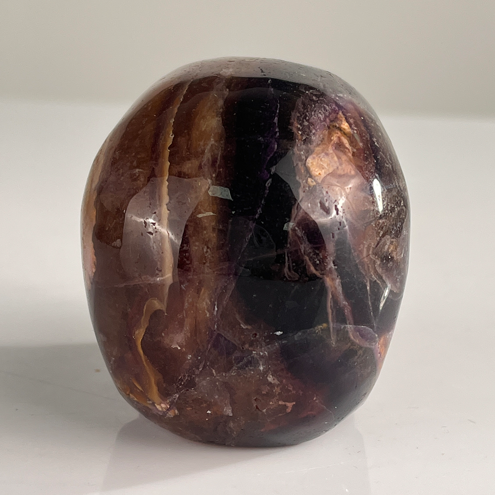 Back view of a 3-inch Fluorite human skull carving