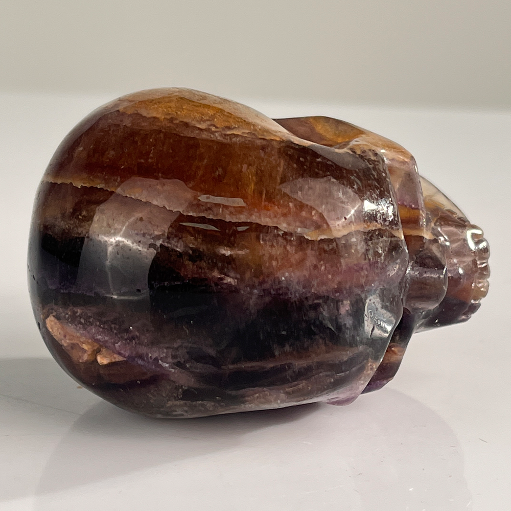 Top view of a 3-inch Fluorite human skull carving