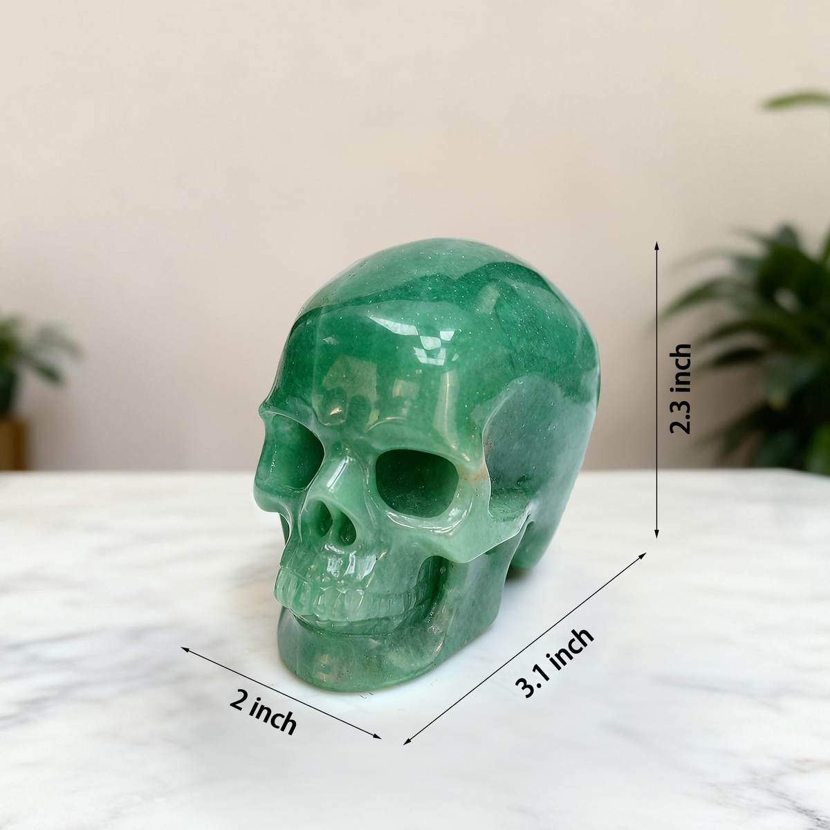 Additional view of a 3-inch Green Aventurine human skull carving