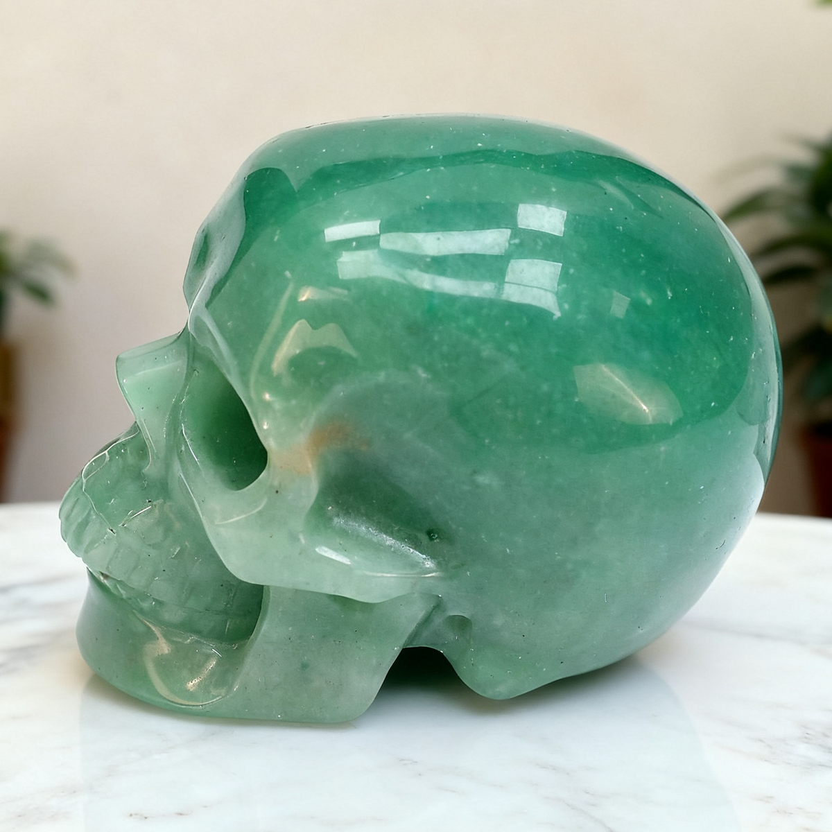 Additional view of a Green Aventurine human skull carving