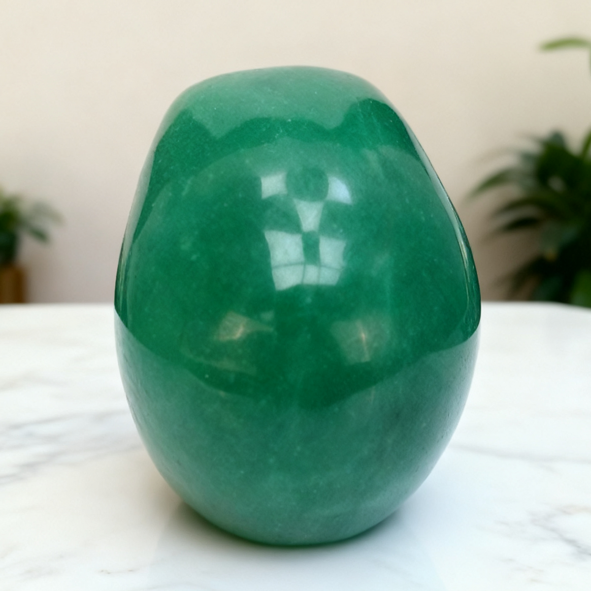 Additional view of a Green Aventurine human skull carving