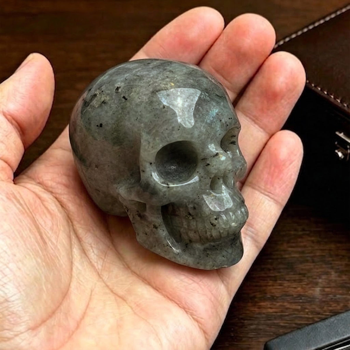 Main view of a 2-inch Grey Labradorite human skull carving