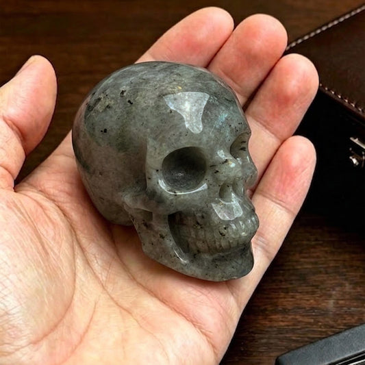 Main view of a 2-inch Grey Labradorite human skull carving