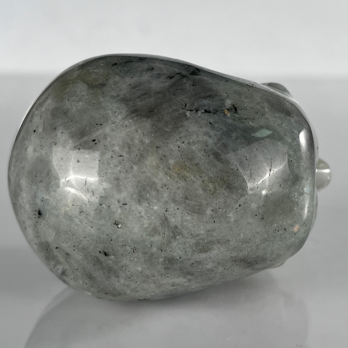 Top view of a 3-inch Grey Labradorite human skull carving